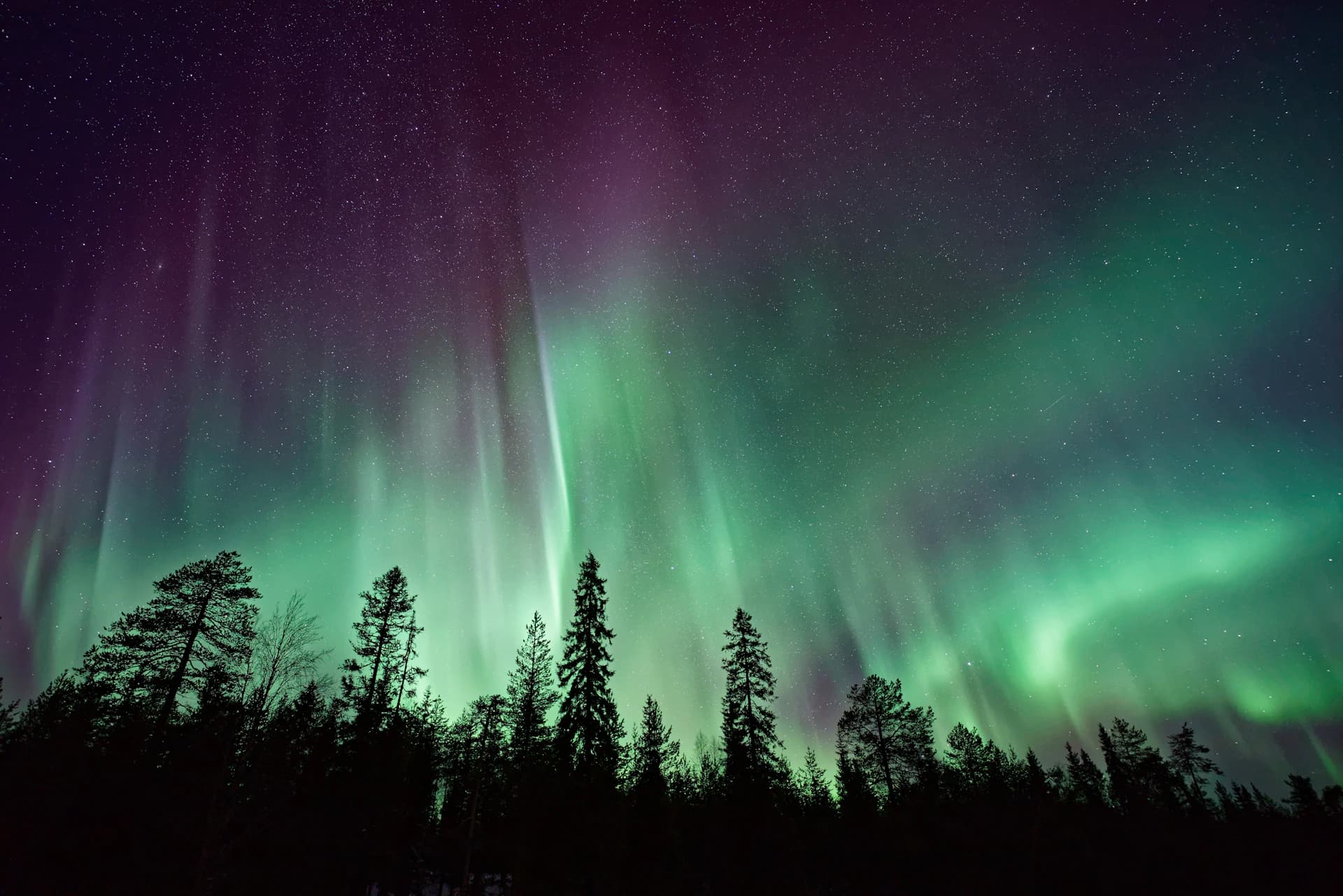 Northern lights over Kirkjufell mountain in Iceland